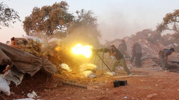 Syrische Rebellen im Kampf gegen die regimenahe Schabiha-Miliz im Nordwesten Syriens © Omar Haj Kadour/AFP/Getty Images