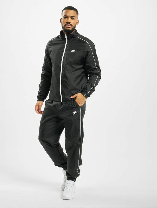 Nike Anzug Woven Track in schwarz 