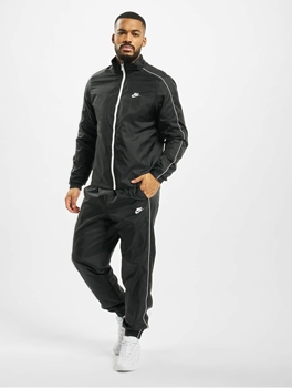Nike Anzug Woven Track in schwarz 